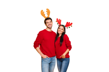 Portrait of two lovely people romantic couple  hug enjoy wear elk horns mask red pullover denim jeans isolated over yellow background