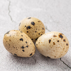 Fototapeta premium Easter quail eggs. Spring background with small easter quail eggs. Vintage photo processing