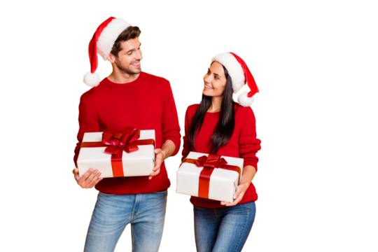 Portrait of positive married people with brown hair get packages wear red pullover denim jeans isolated over yellow background