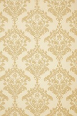 A classic damask pattern in a subdued shade of cream on a pale gold background, radiating timeless elegance