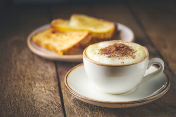 Cappuccino with soft crema on top of the coffee