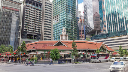 Obraz premium Telok ayer market with tall skyscrapers on a background timelapse hyperlapse.