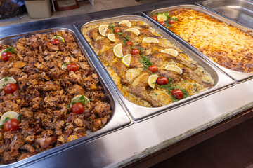 Take-out food in showcase window. Food for home.