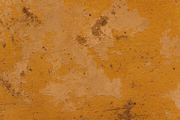 Abstract old vintage dark yellow color shabby scratched wall background 