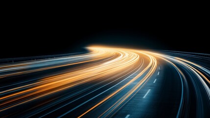 Fototapeta premium Dynamic light trails on a curved road at night showcasing speed and motion in an urban environment.