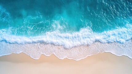 Obraz premium Aerial View of a Turquoise Ocean Crashing on a White Sandy Beach