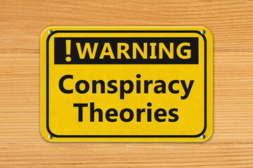  Warning Conspiracy Theories hanging sign