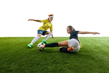 Young athletic woman, mid-20s, executing powerful flying kick towards ball, showcasing agility and...