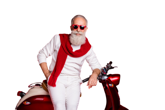 Amazing aged man sitting on retro moped posing like santa wear jumper and trousers isolated red background