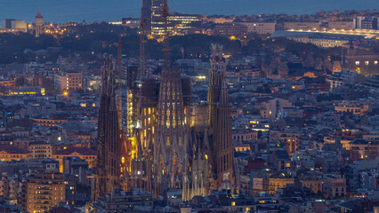 Fototapeta premium Panorama of Barcelona night to day timelapse, Spain, viewed from the Bunkers of Carmel