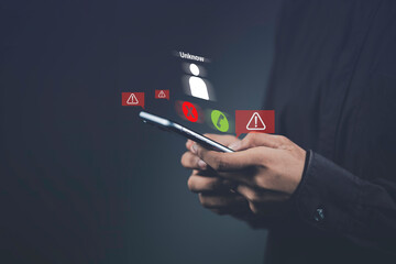 Dangers of phone scams and fraud. Mobile phone with a shadowy figure representing a scammer. Privacy, security, and awareness in protecting against fake calls, hacker threats, and online crime.