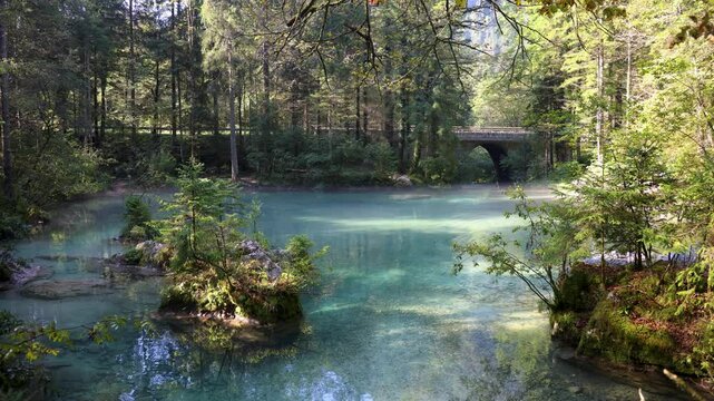 Bridge Over Kamni&scaron;ka Bistrica with Steam Rising from Clean, Blue and Green Flowing Water