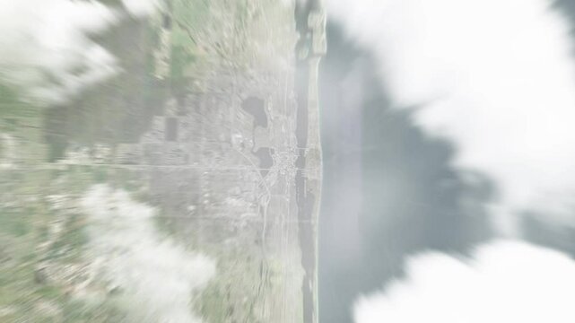 Earth zoom in from space to West Palm Beach, Florida, USA. Followed by zoom out through clouds and atmosphere into space. Satellite view. Travel intro. Images from NASA