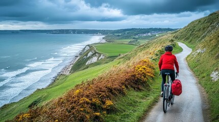 A person cycling along a coastal path