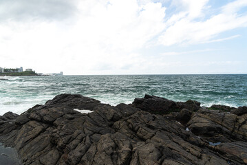 View of Farol da Barra beach on a cloudy day. City of Salvador, Bahia.