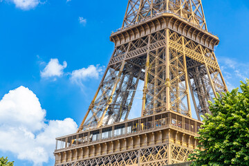 First and second level of the Eiffel Tower on a summer day with a clear blue sky in Paris, France