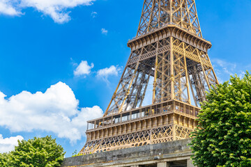 First and second level of the Eiffel Tower on a summer day with a clear blue sky in Paris, France