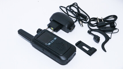 Black portable radio ht or walkie talkie in a white background