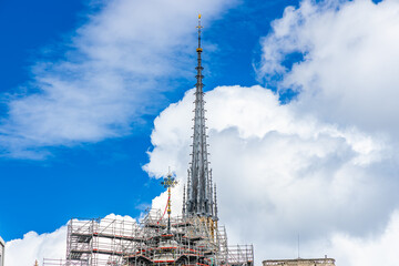 Top of the spire of Notre-Dame cathedral under construction in Paris, France