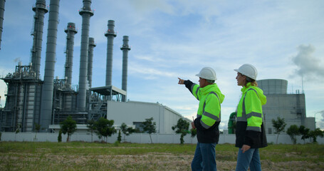 The senior project engineering team Inspects the progress of the building project. Medium-sized...