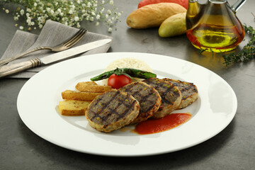 Grilled beef steak served with tender asparagus spears. The juicy steak, charred to perfection, pairs beautifully with the crisp, lightly seasoned asparagus for a balanced, flavorful meal.
