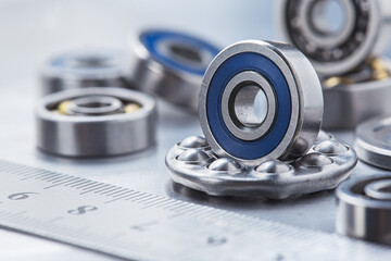 different bearings on a metal background. Part of mechanism.