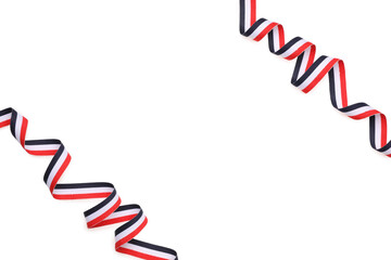 Ribbon in colors of Yemeni flag isolated on white, top view