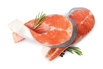 Two fresh salmon steaks, peppercorns and rosemary isolated on white, above view