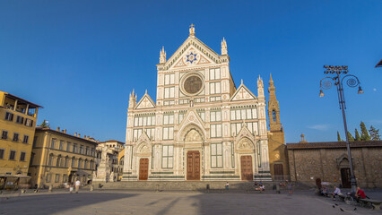 Tourists on Piazza di Santa Croce timelapse hyperlapse with Basilica di Santa Croce Basilica of the Holy Cross in Florence city.