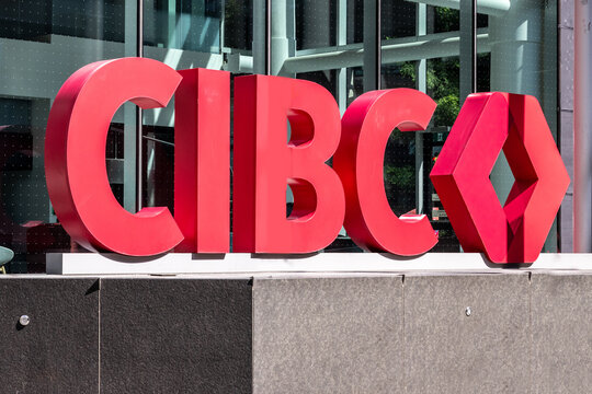 Toronto Canada, August 30, 2024; The bold red 3D sign for the CIBC bank at street level on Bay street in Toronto