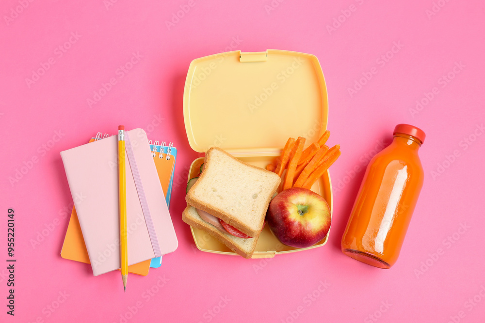 Canvas Prints Lunch box with snacks, bottle of juice and stationery on pink background, flat lay