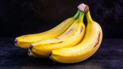 Yellow Bananas on Dark Surface