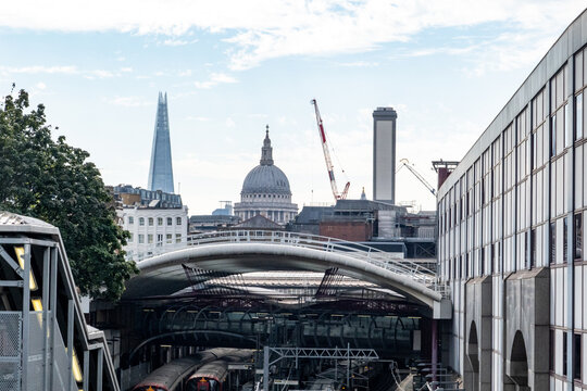 London skyline from a railway bridge in Clerkenwell showing St Paul's Cathedral and The Shard