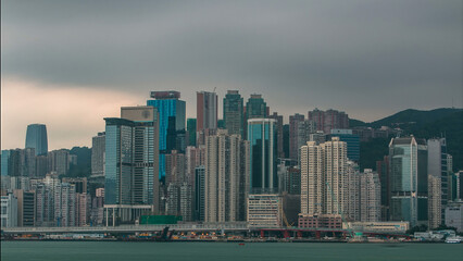 Hong Kong skyline in the morning over Victoria Harbour timelapse.