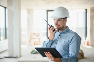 Portrait of an architect builder, professional foreman at work