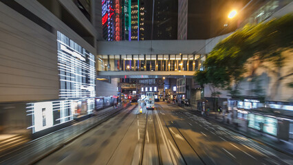 Fototapeta premium View from double-decker tram on street of HK timelapse hyperlapse.