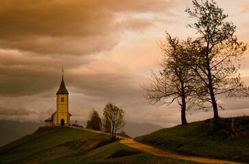 old church in autumn landscape, slovenia-europe