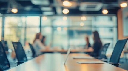 Soft of blurred people meeting at table. Abstract blurred office interior space background