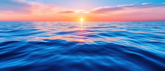 Obraz premium A serene sunset over calm ocean waves, showcasing vibrant colors reflecting on tranquil water, perfect for nature enthusiasts.