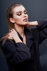 Fashion make up of pretty woman. Fashionable young woman. Portrait of a gorgeous fashion young woman. Elegant girl. Beautiful Model. Fashion portrait of elegant woman.