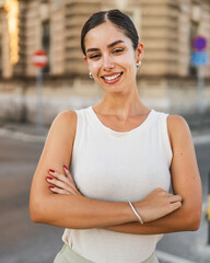 Portrait of beautiful happy young woman stand on the street