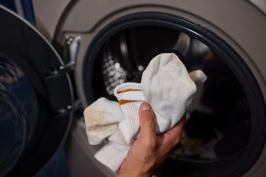 The Laundry Routine Properly Sorting Dark and Light Clothing for Effective Washing Process - Powered by Adobe