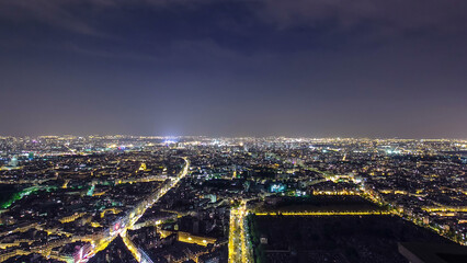 Obraz premium The city skyline at night. Paris, France. Taken from the tour Montparnasse timelapse