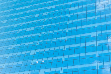 Background of glassy architecture. Modern glass background. Glass facade background. Architecture. Building facade architecture. Building background. Glass building window. Architectural detail