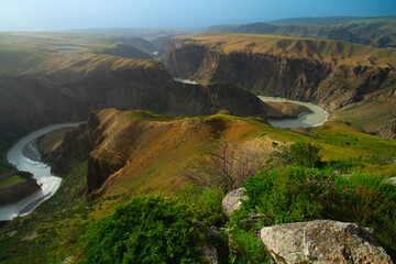 Kuokesu Grand Canyon, one of scenic areas in Kalajun Grassland which the landscape features are high gorges, flat lakes, snow-capped mountains, Tekes County, Ili Kazakh Autonomous Prefecture, Xinjiang
