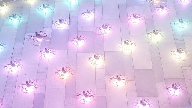 group of drones taking off from floor