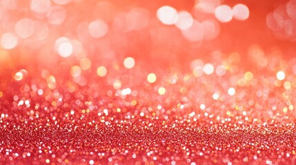 Abstract blurred coral or peach glitter background with a magical and festive feel. Perfect for adding a touch of sparkle and glamour to your designs.
