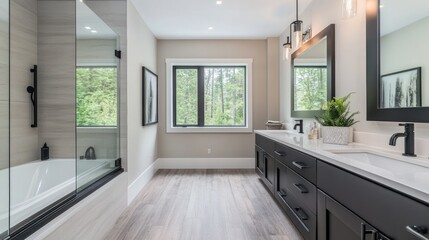 A chic bathroom with black fixtures, a deep soaking tub encased in glass, and a double vanity with quartz countertops and minimalist design.