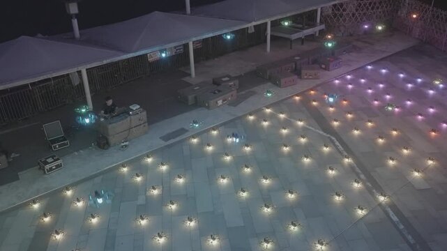group of drones taking off from floor