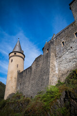 Looking up at the walls of Vianden castle in Luxembourg